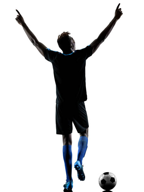 istock one african soccer player man isolated white background silhouet 931384878