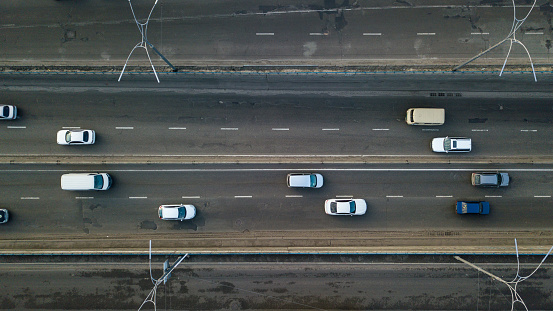 Kiev, Ukraine.- February 02,2018: Aerial view on the road with a lot of passing cars in the city of kiev. Photo taken with a drone