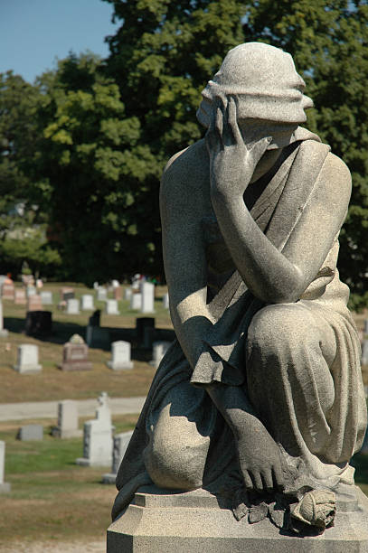 istock Statue of woman weeping 93138835