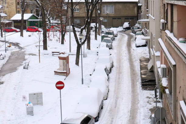 istock Parked cars covered by snow 931388614