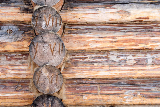 istock The texture of a wooden frame with numbered logs 931388928