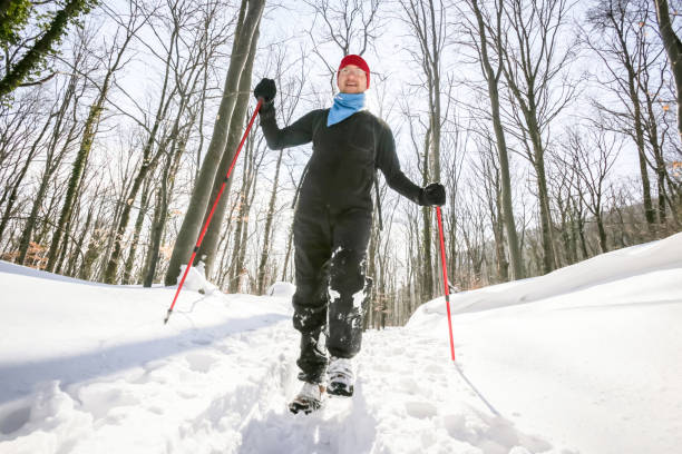 istock Hiker walking on a snowy mountain 931388934