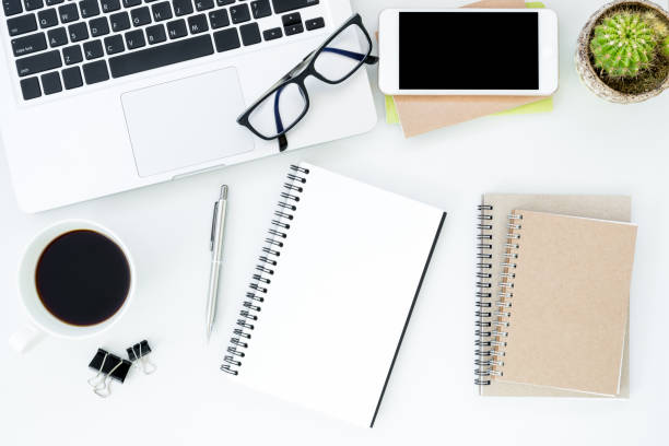 istock White office desk with supplies. Top view, flat lay. 931389816