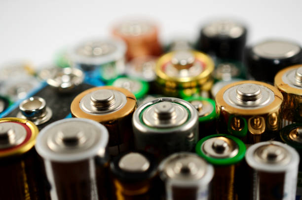 istock lot of old used batteries, blure image 931396906