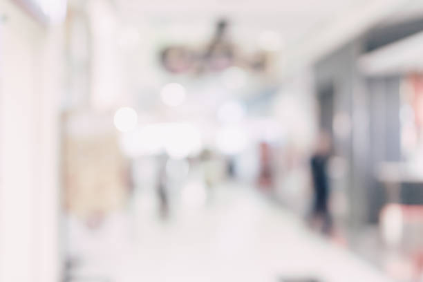 istock Blurred background - Store of shopping mall blur background with bokeh. 931403962