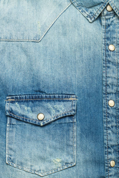 istock Pocket of a blue jean shirt 931407176