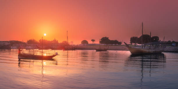 istock Traditional Arabic Dhow boats in Doha harbour 931407976