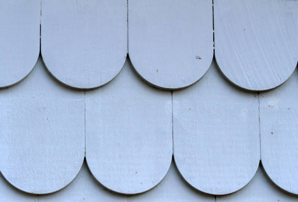 istock Old grey wooden roof tiles 931421280