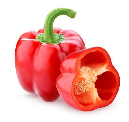 Red sweet bell pepper isolated on white background. One whole vegetable and half sliced.