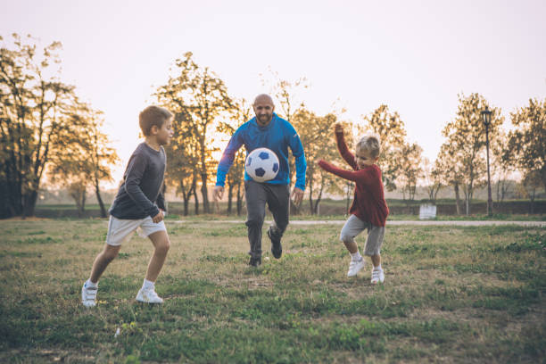 istock Spending great time with kids in park 931423512
