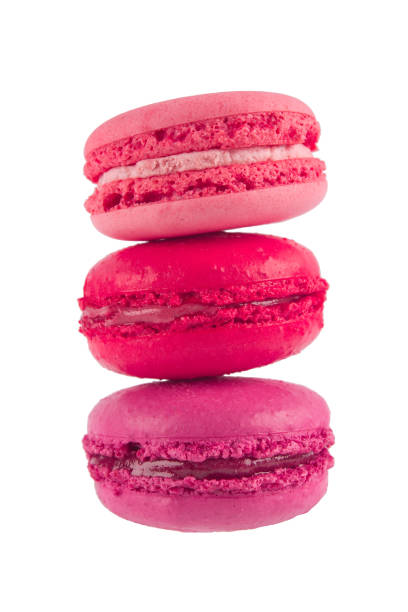 istock macaron pyramid of three pink cookies, isolated on white background 931425892