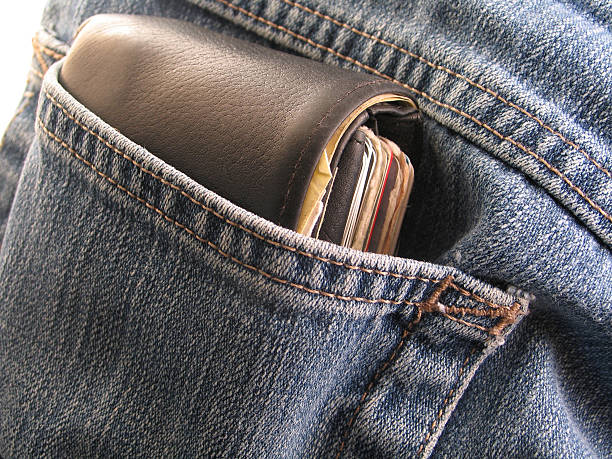 Thick Leather Wallet in Back Pocket  pocket and walet stock pictures, royalty-free photos & images