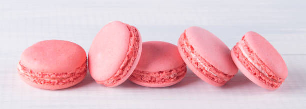istock long row of pink macaron, on a light background 931428234