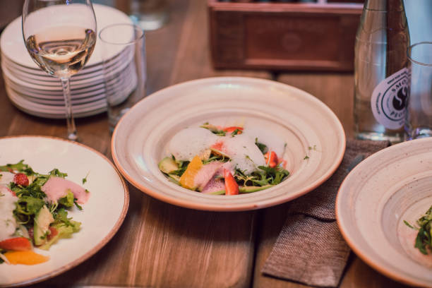 istock salad with vegetables and greens on wooden table 931428538