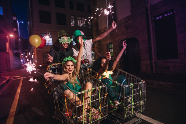 istock Friends enjoying on St.Patrick's day celebration out on street 931432630