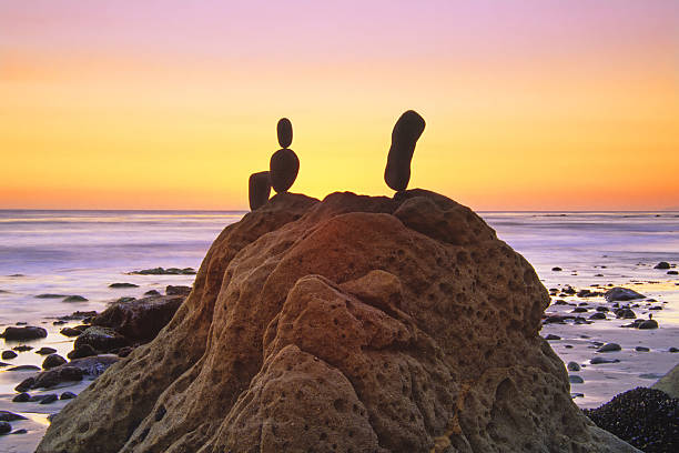 beach sunset  rock sea malibu silhouette stock pictures, royalty-free photos & images