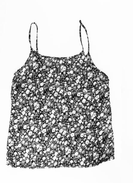 istock Colored sleeveless shirts with a trendy floral pattern, isolated on a white background 931437852