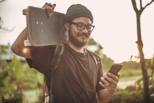 istock Skater with mobile phone 931441540