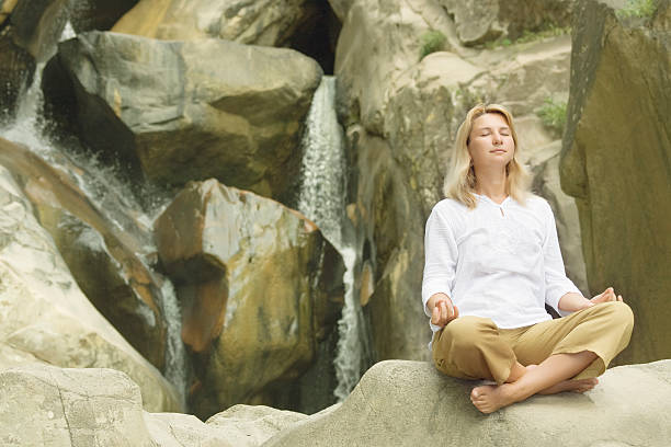 istock Young woman doing yoga exercises 93144648