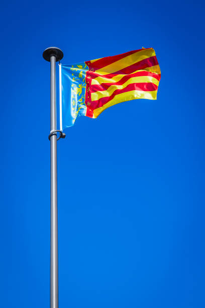 Comunidad Autonoma de Valencia flag against deep blue sky. DSRL outdoors photo taken with Canon EOS 5D Mk II and Canon EF 24-105mm f/4L IS USM Wide Angle Zoom Lens