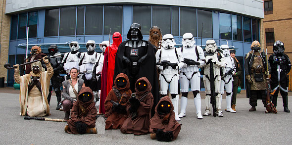 Doncaster racecourse, Doncaster, UK - October 7, 2018. A group of cosplayers dressed as characters from the Star Wars movies including Darth Vader, Stormtroopers, Chewbacca and Jawas at a comic con in Doncaster, UK.