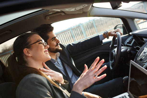 istock Two business people in the car. 931457746