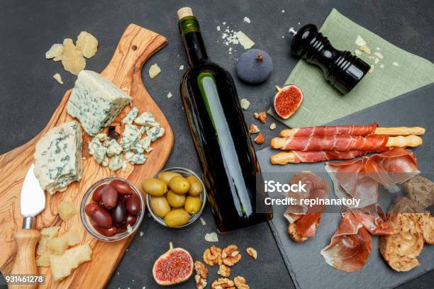 Traditional Italian Food Prosciutto Cheese Wine Olives And Bread Stock Photo - Download Image Now