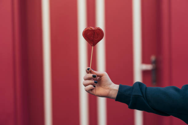 3D Rendering of Heart Shape Lollipop Background, Abstract Valentine's Day Concept