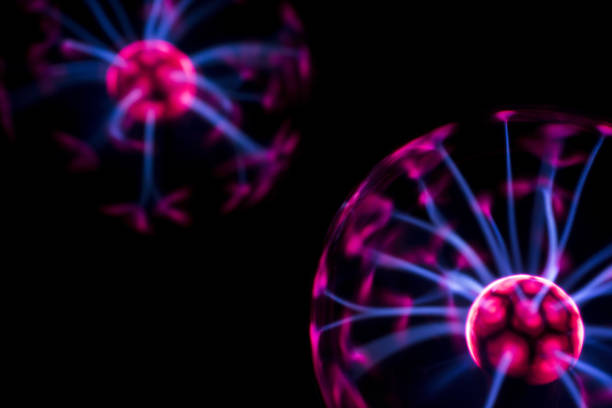 Electricity fire-ball. Abstract photo of electric waves. Electricity fire-ball. Abstract photo of electric waves. Static electricity plasma ball photos stock pictures, royalty-free photos & images