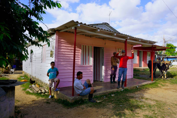 Vinales / Cuba- January 19, 2018: workers are standing in front of theri houses at Vinales  valley, Cuba