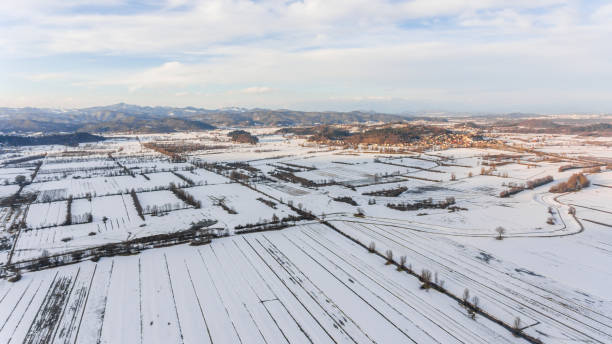 istock Aerial view of snow covered countryside. 931467046
