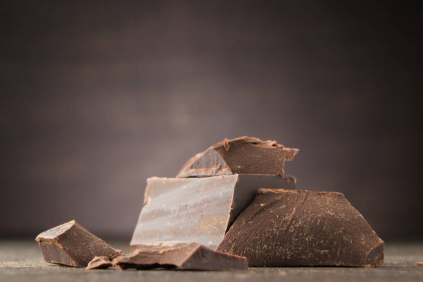istock Dark chocolate on a wooden background 931467062
