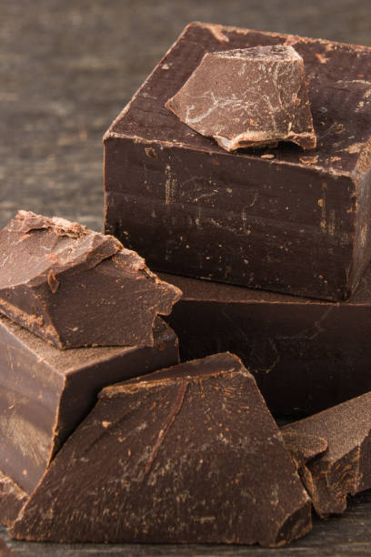 istock Dark chocolate on a wooden background macro 931467210