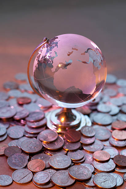 istock Glass World and coin 93146924