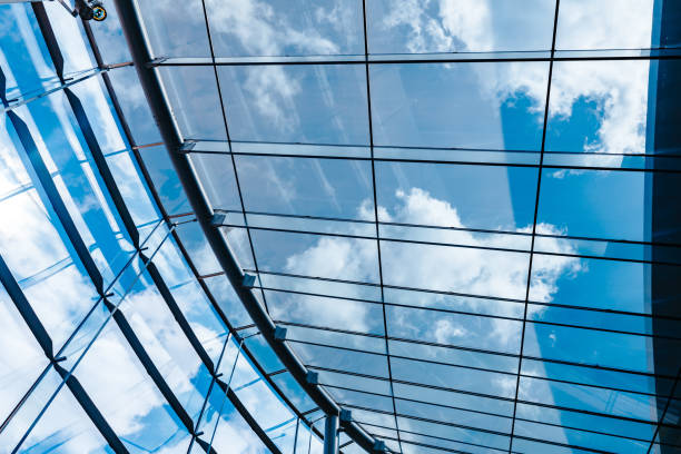 istock Architecture Abstract Modern Glass Roof and Blue Sky 931469754
