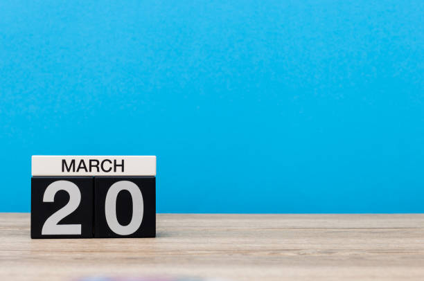 istock March 20th. Day 20 of march month, calendar on light blue background. Spring time, empty space for text, mockup 931477140