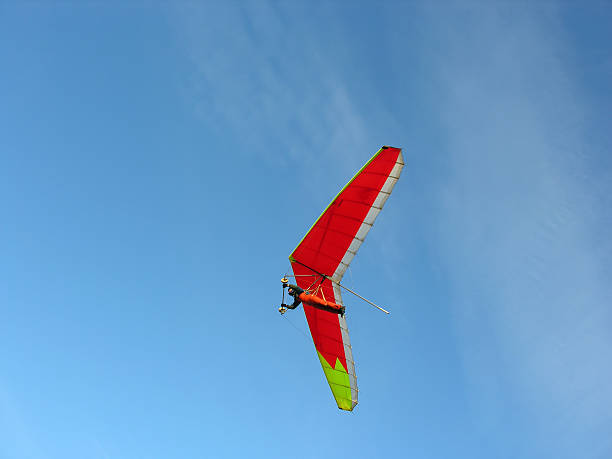 red hangglider  glider hang glider hanging sky stock pictures, royalty-free photos & images