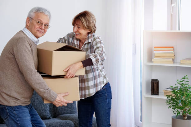 istock Senior couple moving into a new apartment 931484110