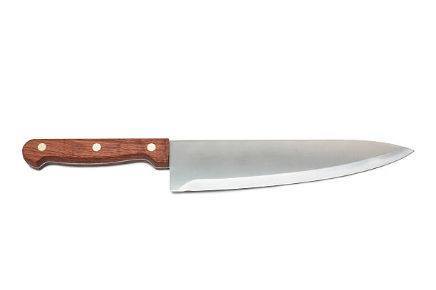 Sharp bladed kitchen knife with brown wooden handle New kitchen knife on a white background knife weapon photos stock pictures, royalty-free photos & images