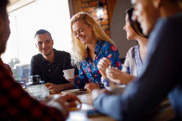 istock Enjoying coffee with my friends at a cafe 931491456
