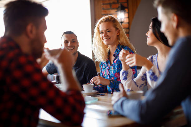 istock Friends enjoying coffee at a cafe 931491642