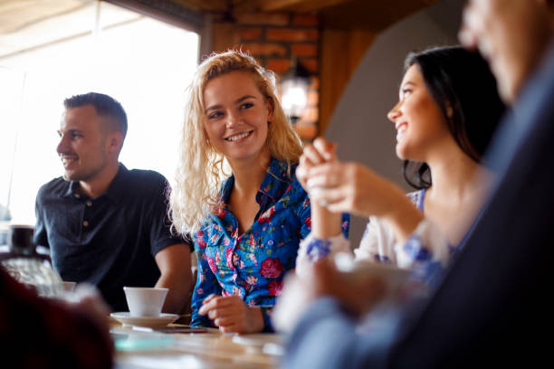 istock Colleagues enjoying coffee at a cafe 931491864