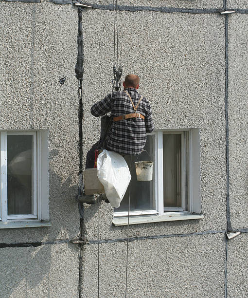 istock renovation worker on a block of flats #3 93149327