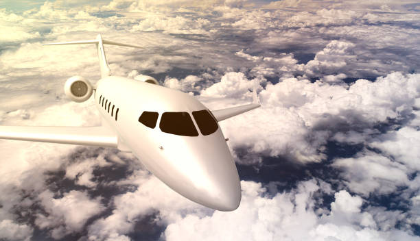 istock Front view of private learjet aircraft flying over the clouds 931494592