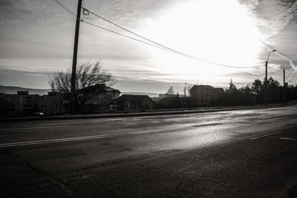 istock Sunrise on street black and white 931495262