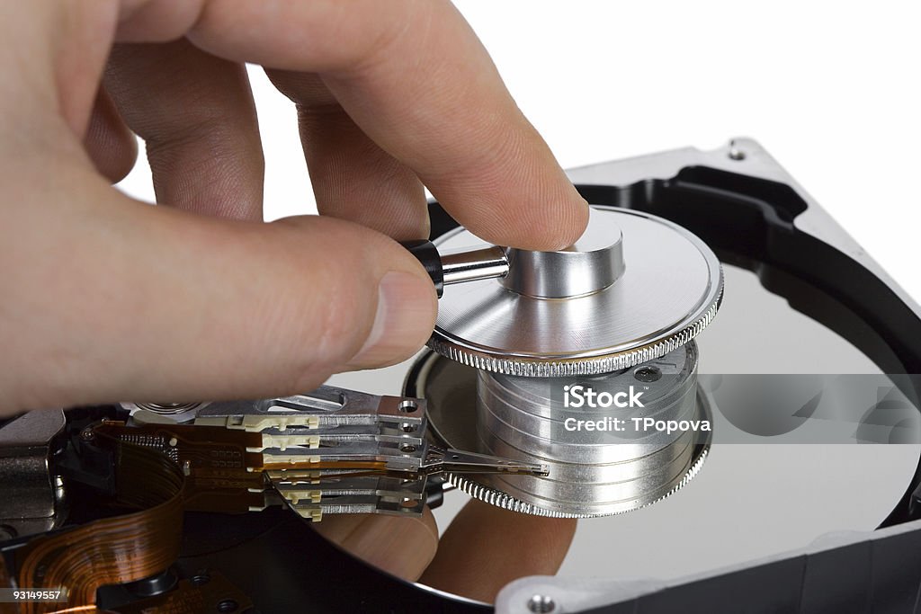 Mano con stetoscopio e computer, unità disco rigido - Foto stock royalty-free di Accudire