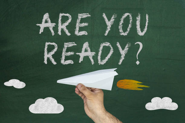 istock Are you ready text and hand with airplane on green chalkboard 931501628