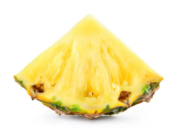 Photo of Pineapple slice isolated on white background.