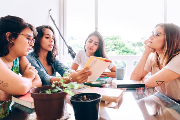 istock Group of young women studying at home 931505478