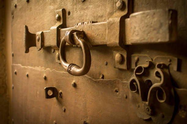 istock medieval locked on the old wooden door 931505988